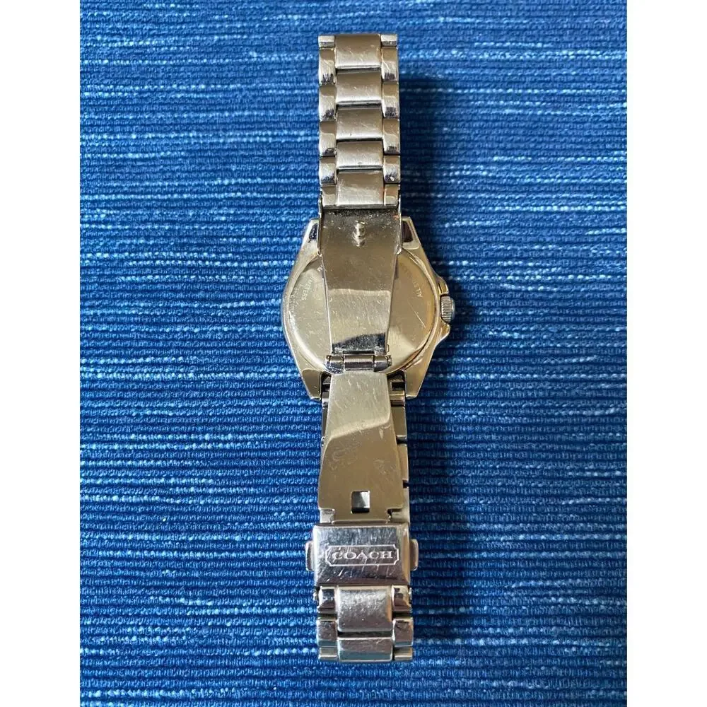 NEEDS A BATTERY Stainless Steel Coach Quartz Wristwatch Pink Face 89B
